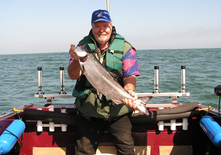 Bill Shelton holding a salmon